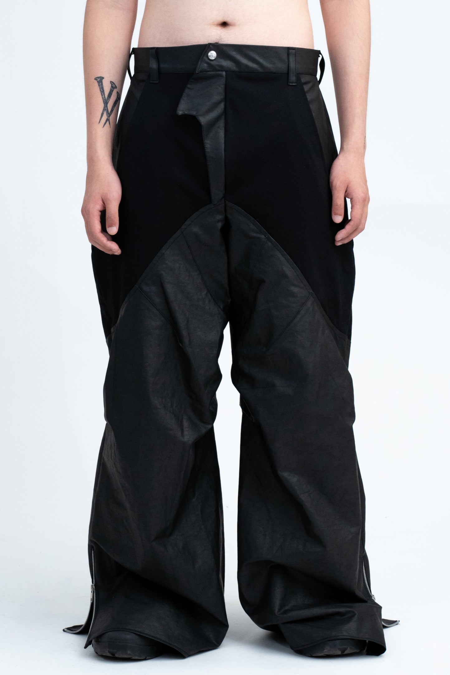 RHITTA WAXED PARACHUTE PANTS