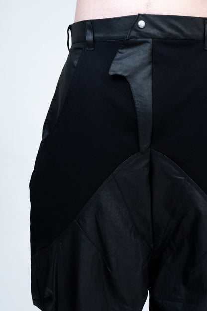 RHITTA WAXED PARACHUTE PANTS